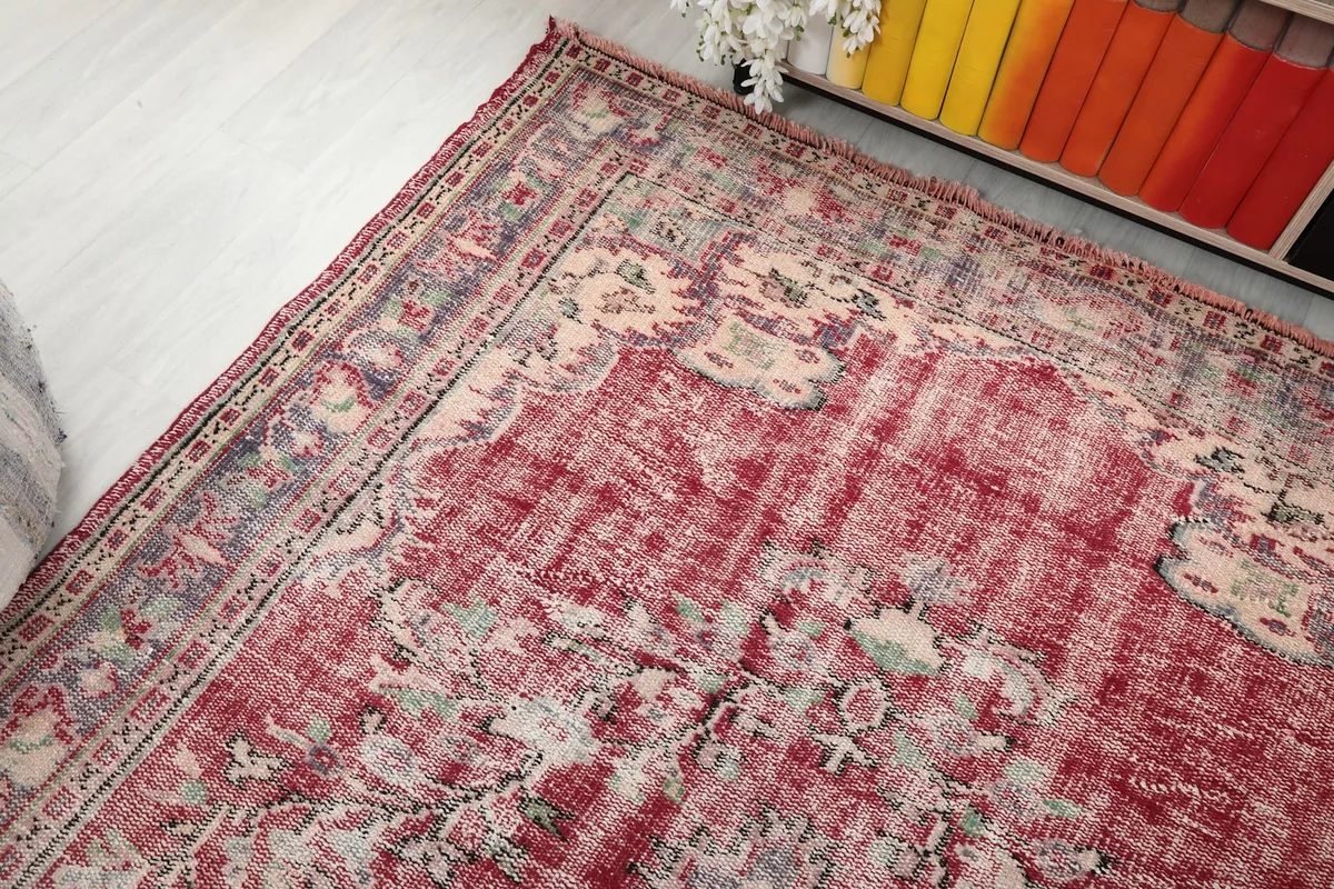 Overhead angle view of the rug, capturing the overall pattern and color variations from a higher perspective.