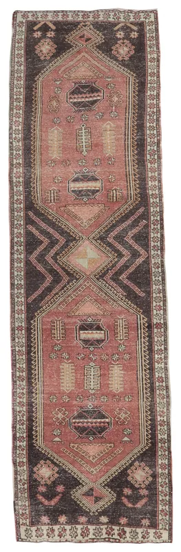 Full overhead view of the rose and charcoal tribal geometric vintage Anatolian runner rug