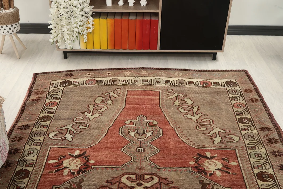 View of the rug from one end, showing its placement relative to furniture