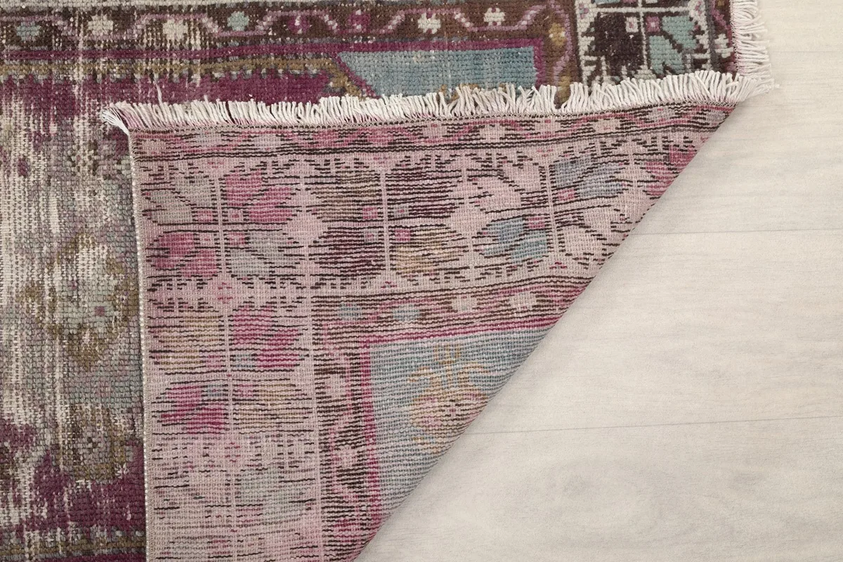 Another view of the back of the rug, displaying the tight hand-knotted structure