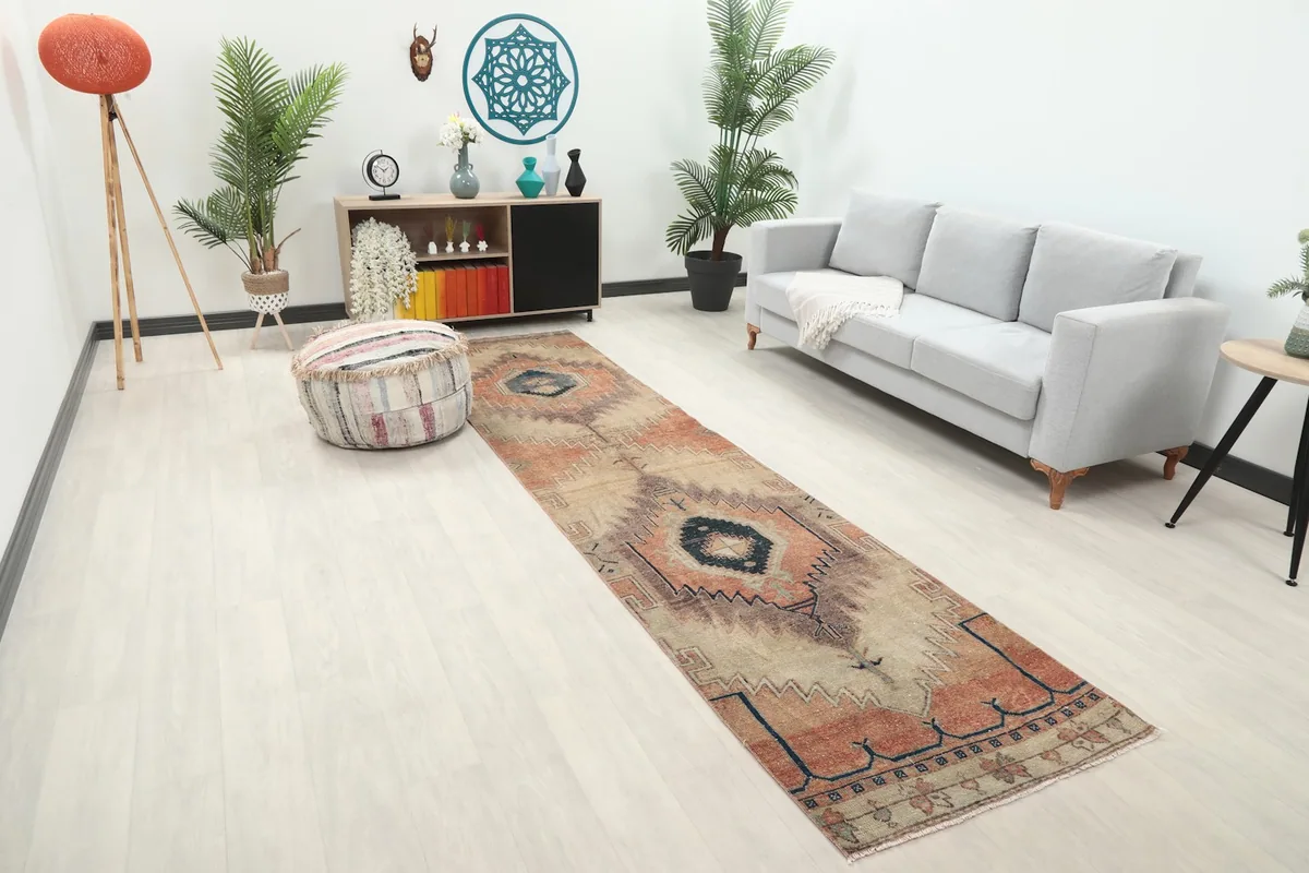 Angled view of the runner rug in a room, highlighting its placement and design alongside furniture