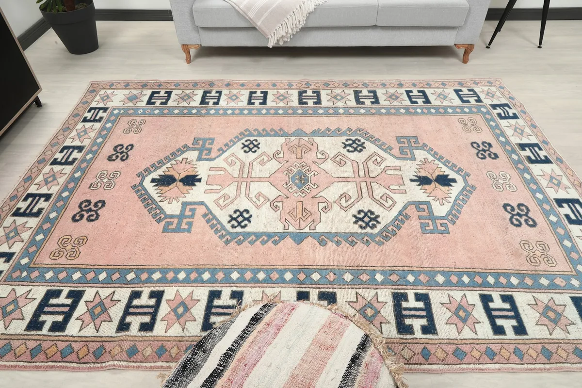 Full room view of the rug, emphasizing its size and impact in a contemporary setting
