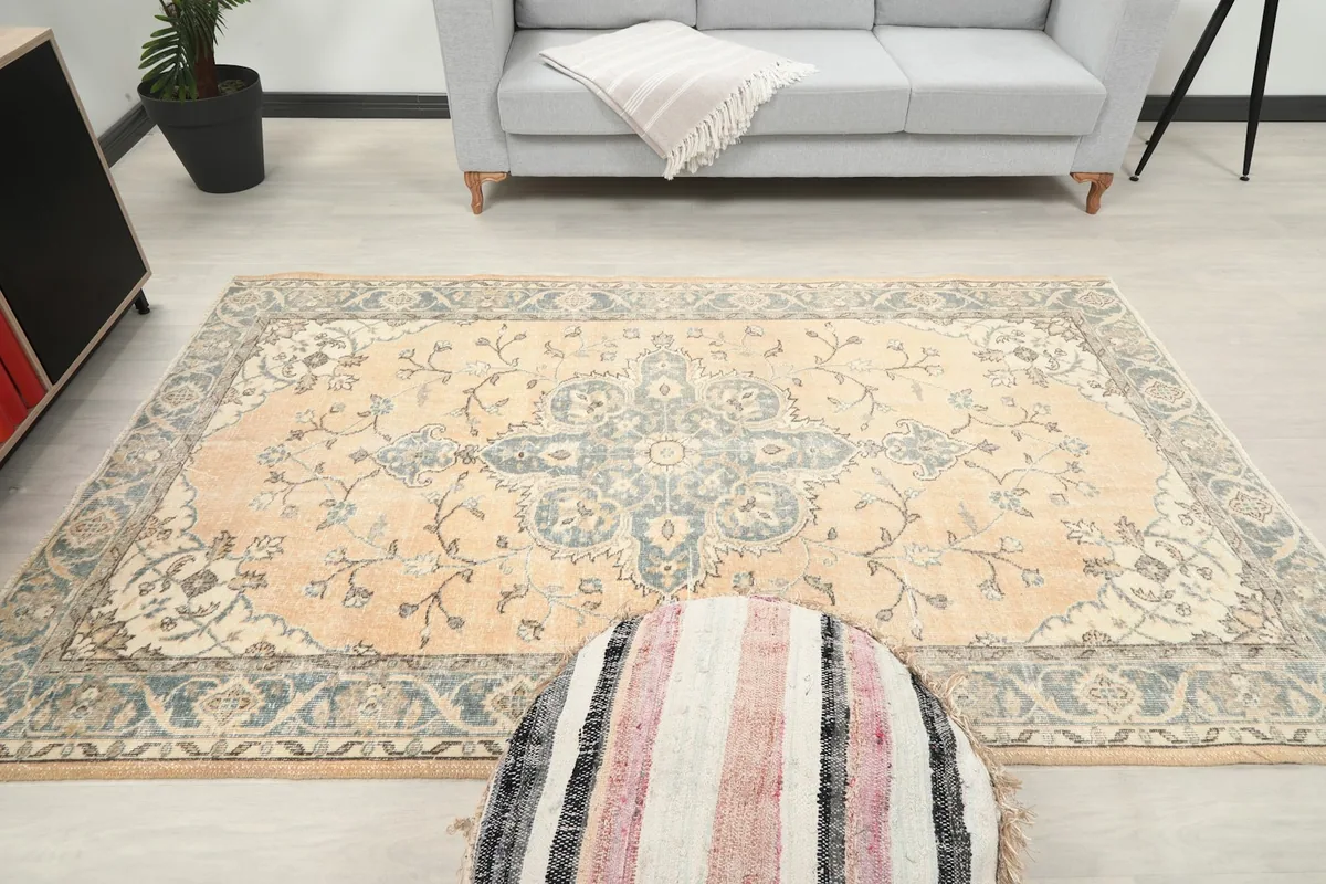 Overhead view of the rug in a room, offering a full perspective of its design and dimensions