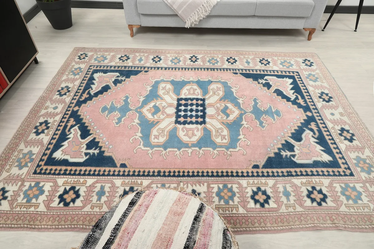 Overhead view of the rug in a living room, showcasing its full design and integration with decor.