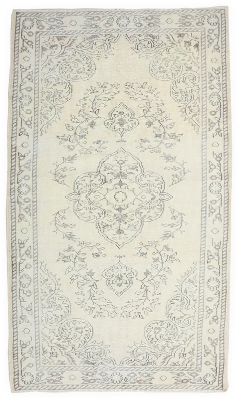 Full overhead view of the ivory and gray vintage Anatolian area rug