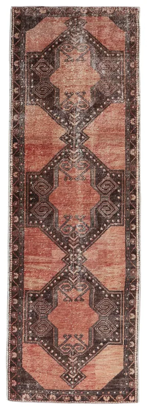 Full overhead view of the 3'5" x 10'5" vintage Anatolian runner rug with rust and charcoal geometric patterns.