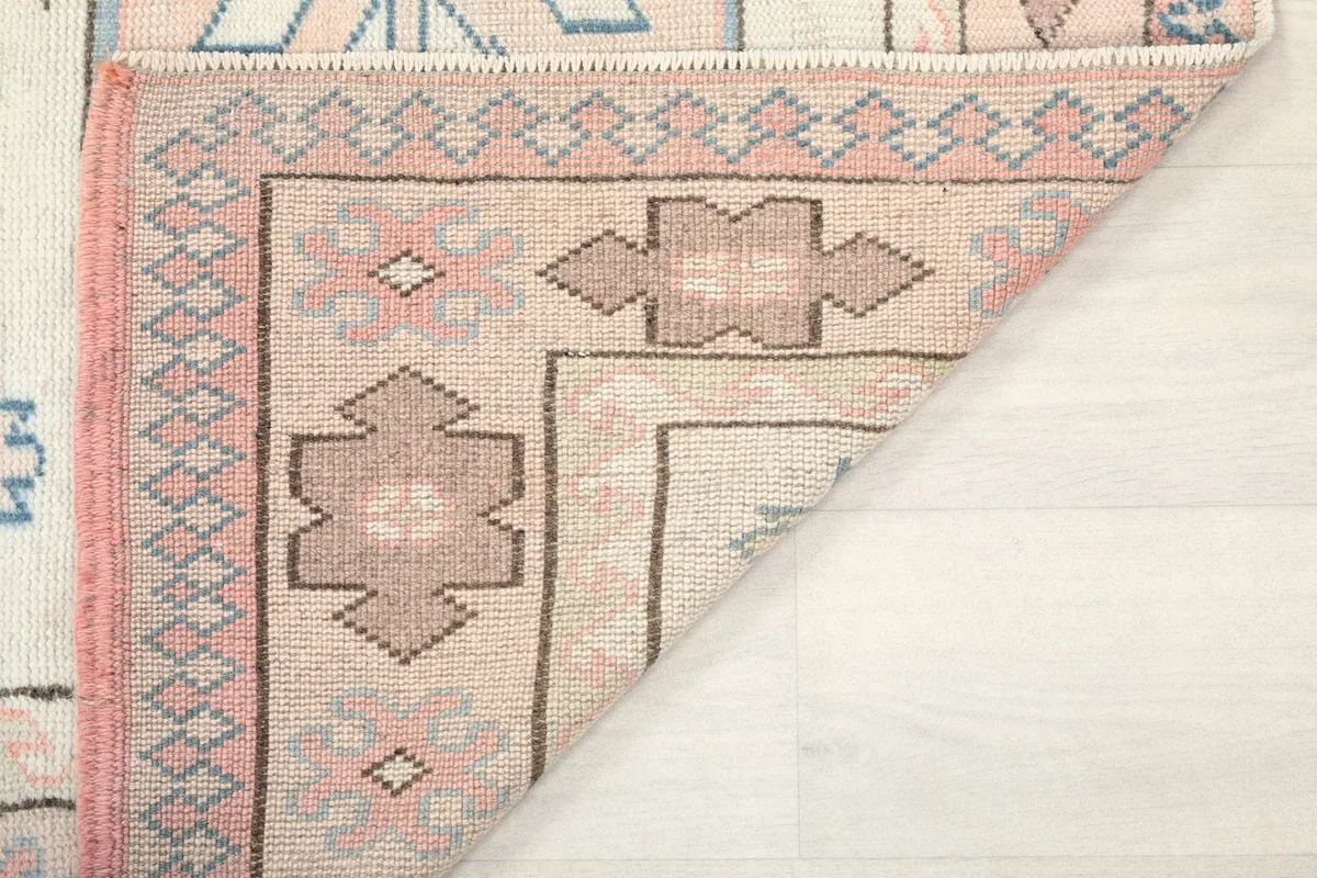 Another folded corner view, emphasizing the quality of the vintage wool and cotton materials