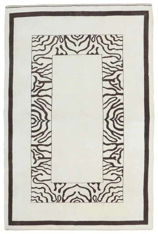 Full top view of the vintage Anatolian rug with cream field and charcoal geometric patterns