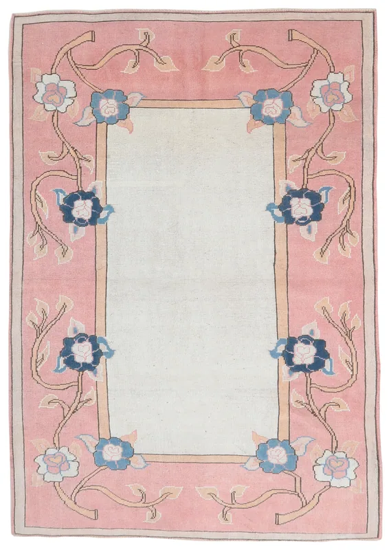 Full top view of the rose and ivory vintage Anatolian area rug