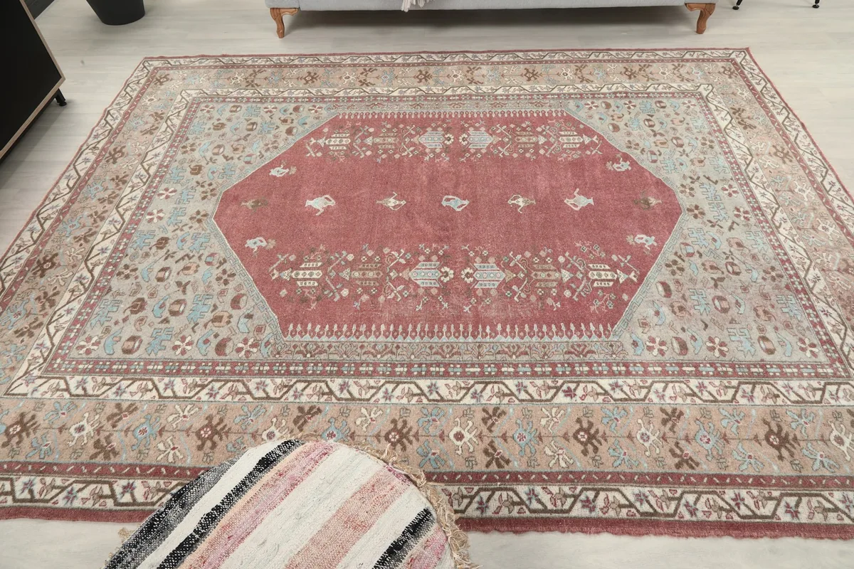 Overhead view of the rug in the room, showcasing the full design and its interaction with furniture