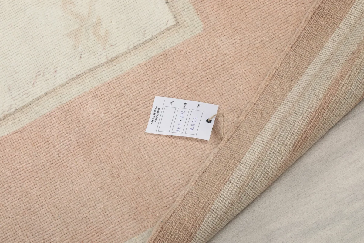 Care tag attached to the rug, displaying product information