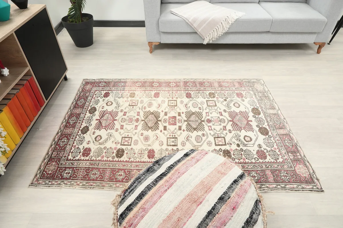 Full room view of the rug, providing context of its size and design within a contemporary setting.