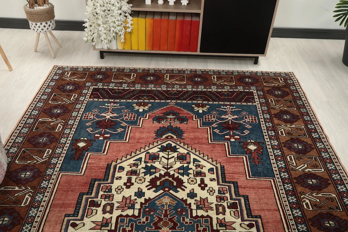 Overhead view of the vintage rug in a living room, highlighting its size and placement