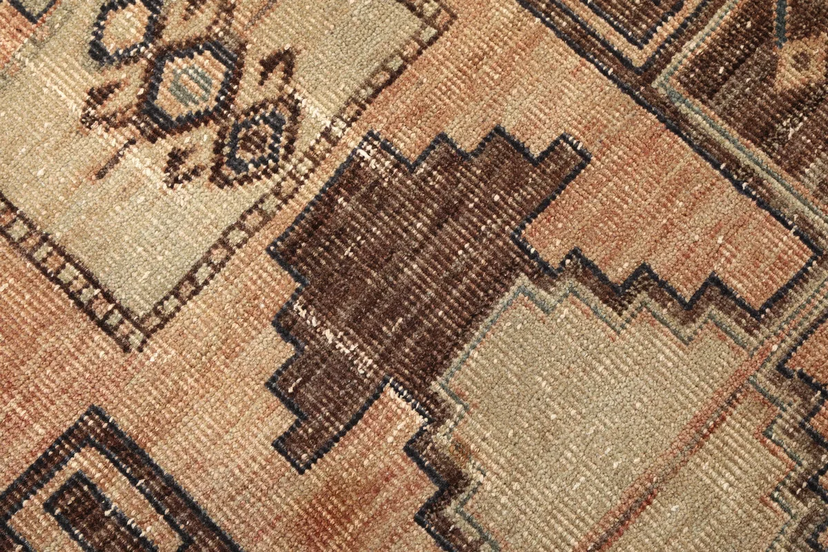 Close-up of the Earth Tone Geometric Anatolian Runner's low wool pile and hand-knotted texture.