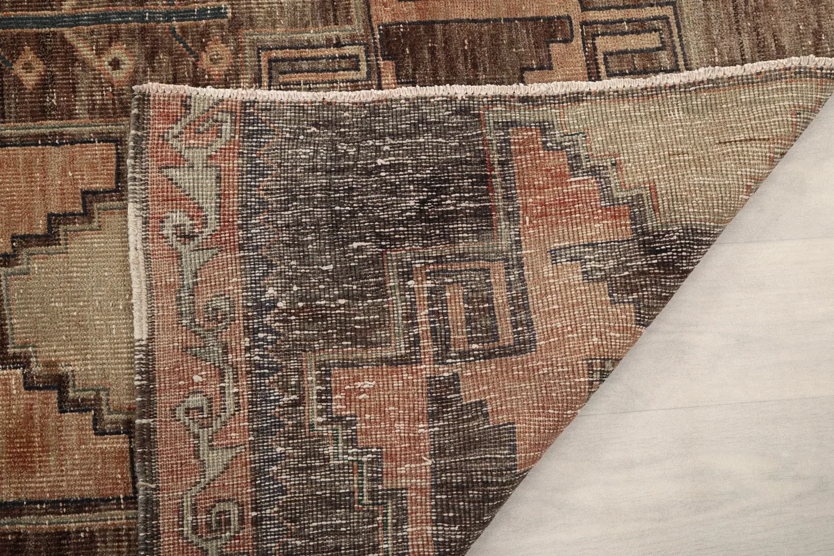 Another view of the Earth Tone Geometric Anatolian Runner's back, showing the hand-knotted construction.