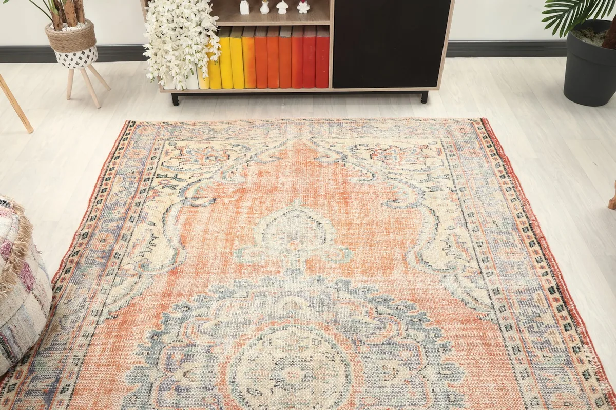Overhead view of the rug in a room, showcasing its full design and proportions