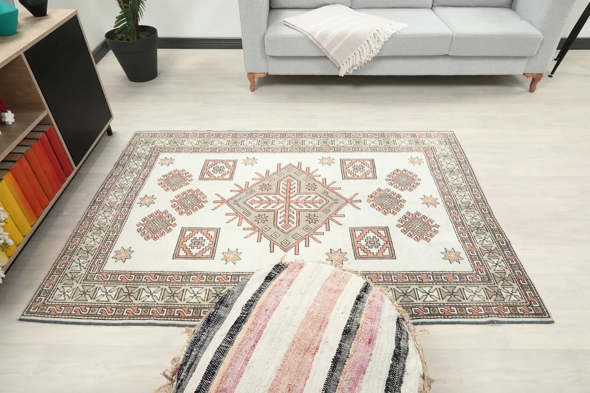 Full room view of the rug, demonstrating its small size and placement in a living area.