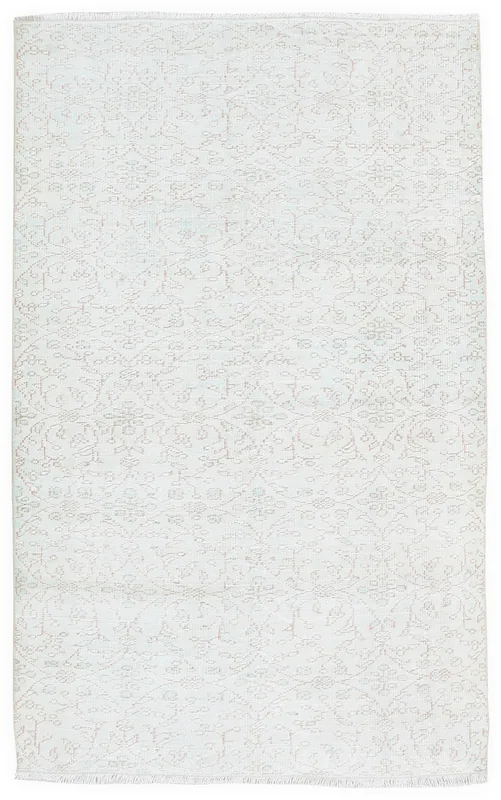 Full overhead view of the 4'9" x 7'9" cream and rose vintage Anatolian area rug