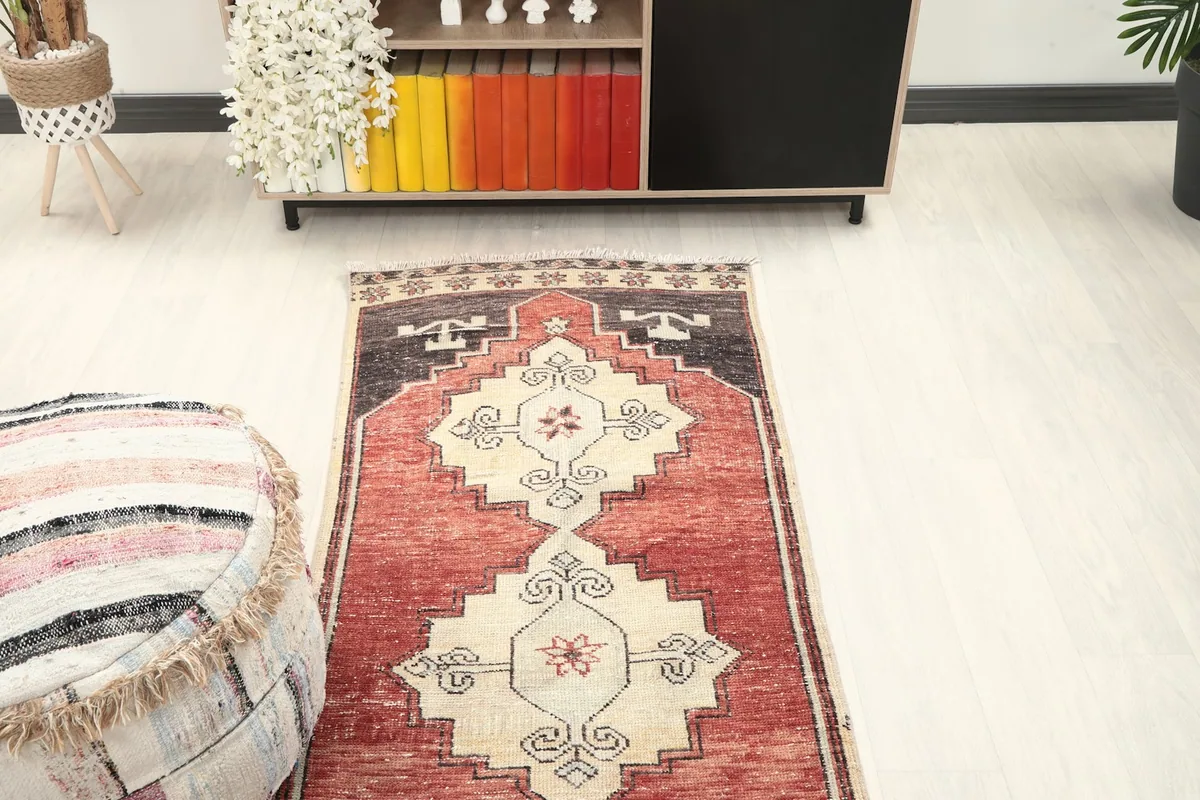 Overhead view of the runner rug from one end, showing its placement in a room setting.