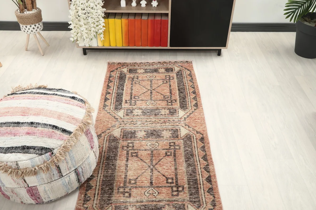 Overhead perspective of the runner rug in a room setting, emphasizing its length and design.