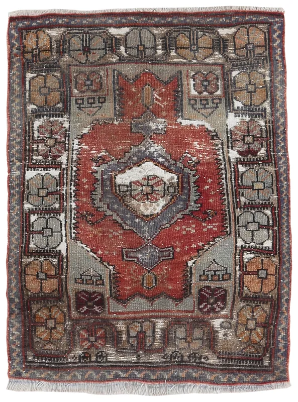 Faded Red Tribal Geometric Rug, full top view showing its central medallion and border.