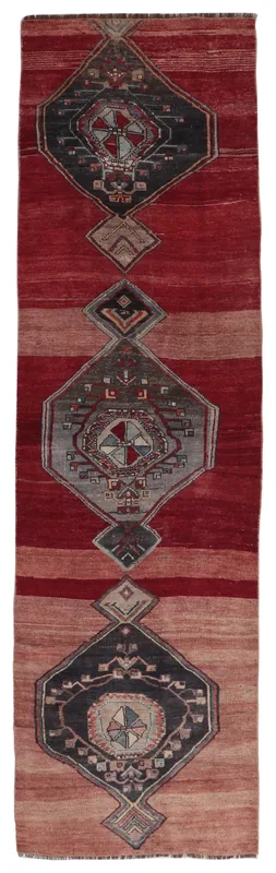 Full top view of the red and gray geometric vintage Anatolian runner rug on a white background.
