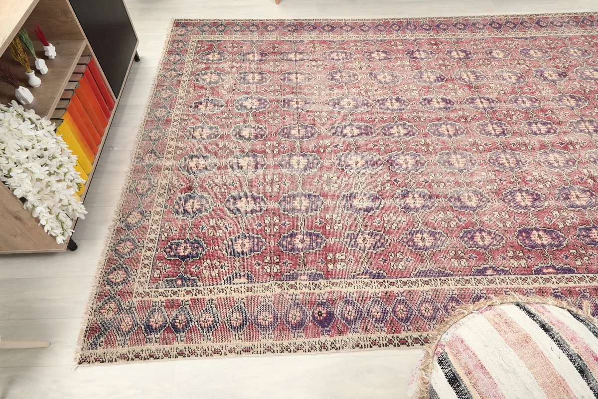 Wide shot of the rug in a room, capturing its scale and integration with decor