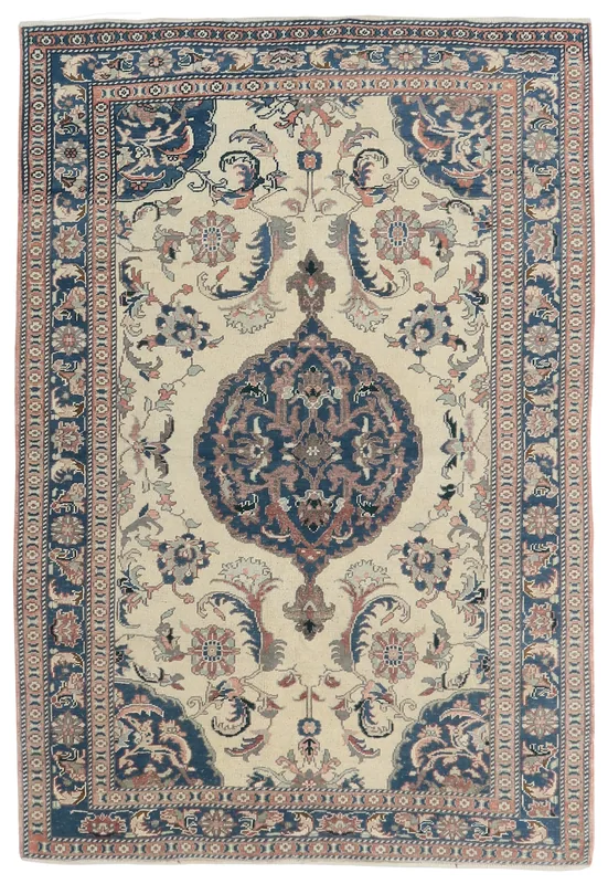 Full top view of the ivory, blue, and rose vintage Anatolian rug