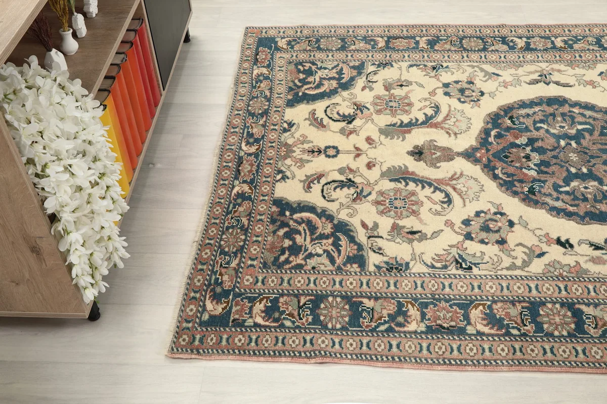 Side view of the rug on a light floor, emphasizing its rectangular shape and pattern