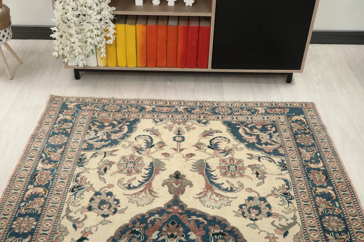 View of the rug from above, showcasing its placement in a room with furniture