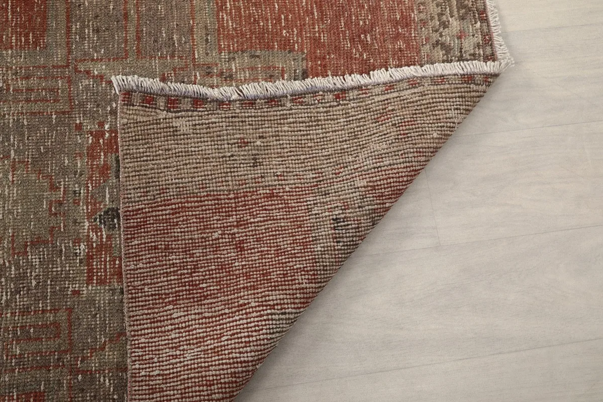 Underside view of the hand-knotted wool pile on cotton foundation