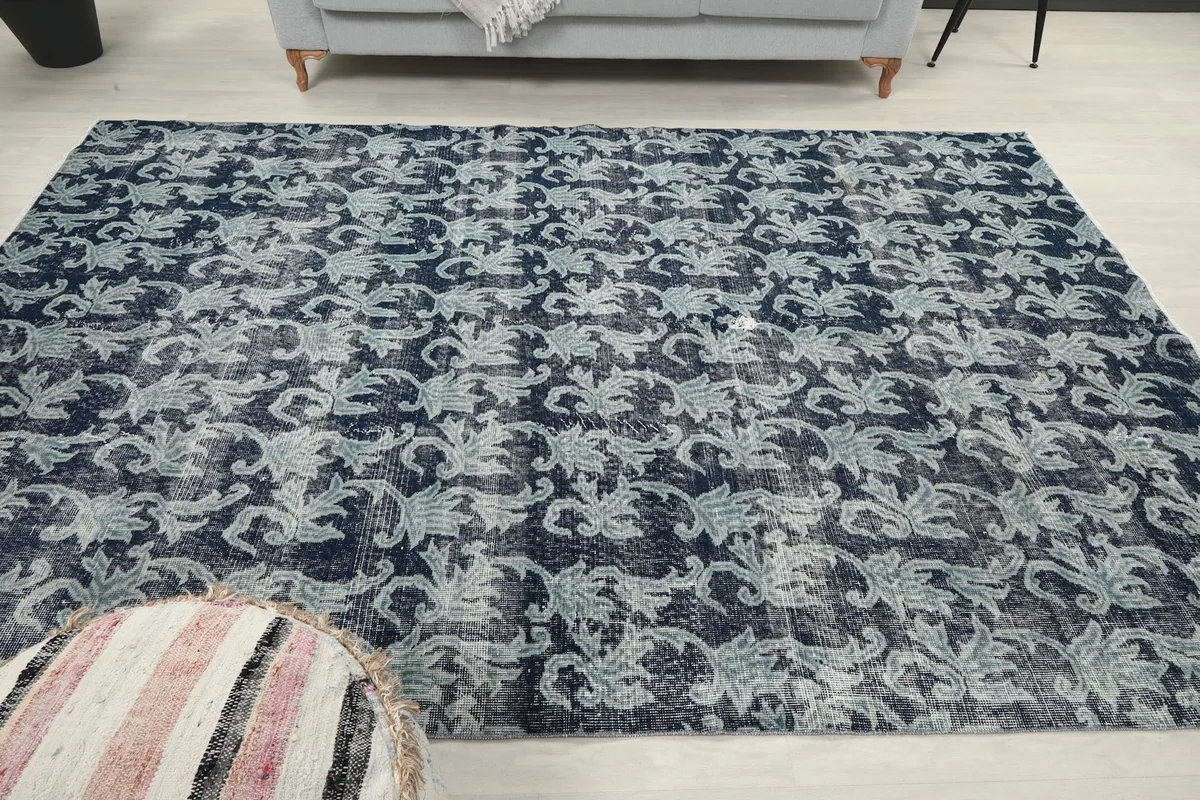 Frontal view of the rug in the room, providing a clear perspective of its size and pattern.