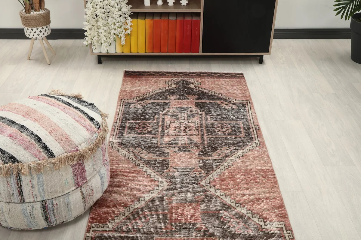 Overhead view of the runner rug in a room setting, highlighting its placement near furniture