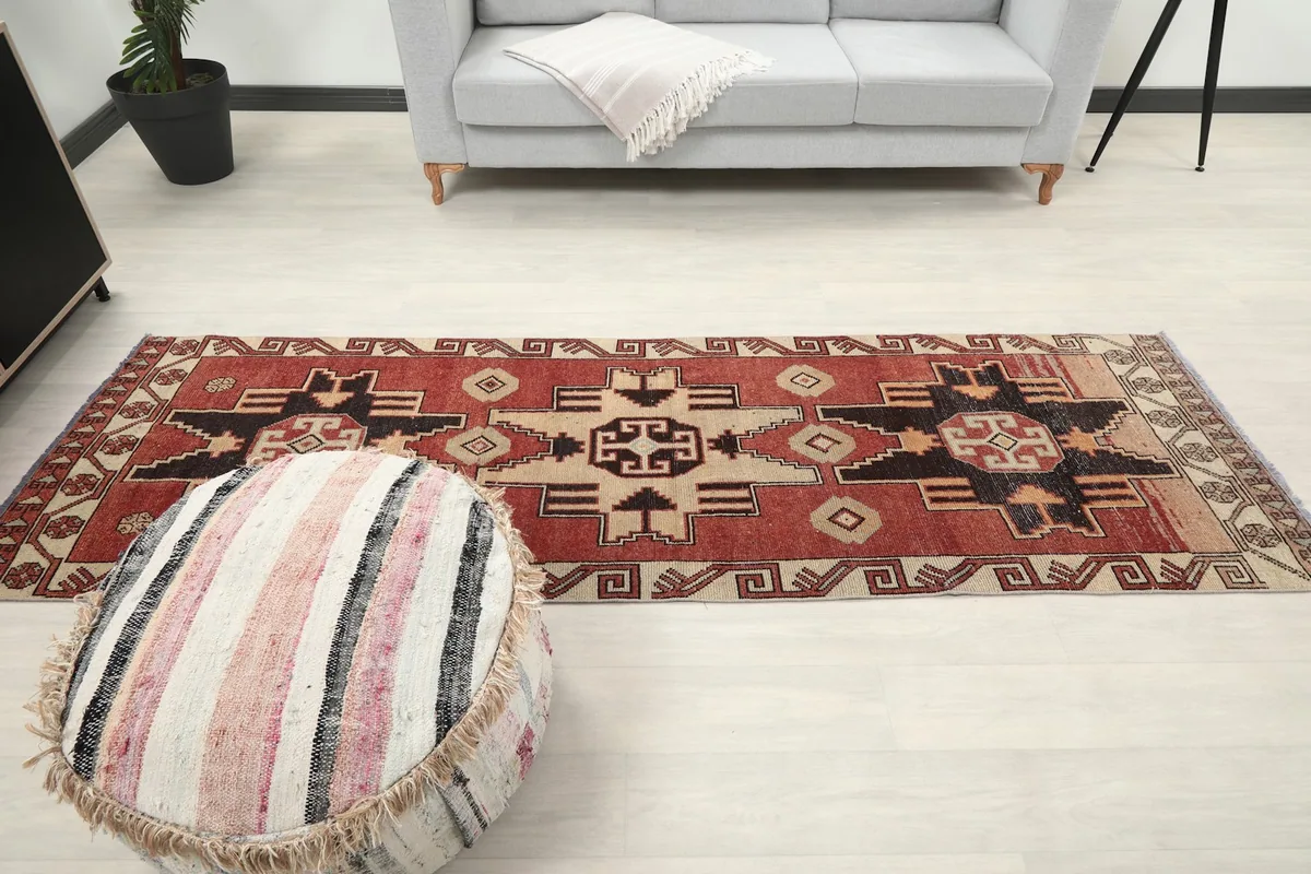 Full length view of the runner rug from a distance, placed in a modern living area
