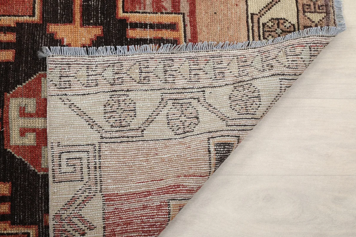 Another view of the reverse side of the rug, showing the intricate knotting and foundation