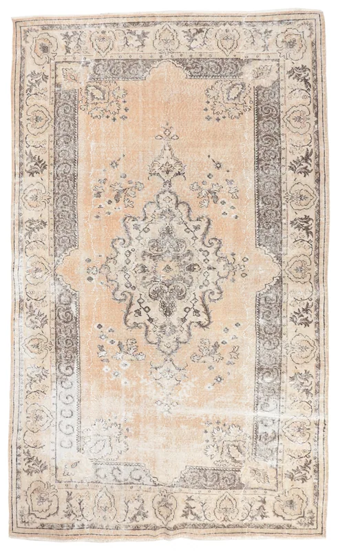 Full overhead view of the beige and charcoal hand-knotted vintage Anatolian rug