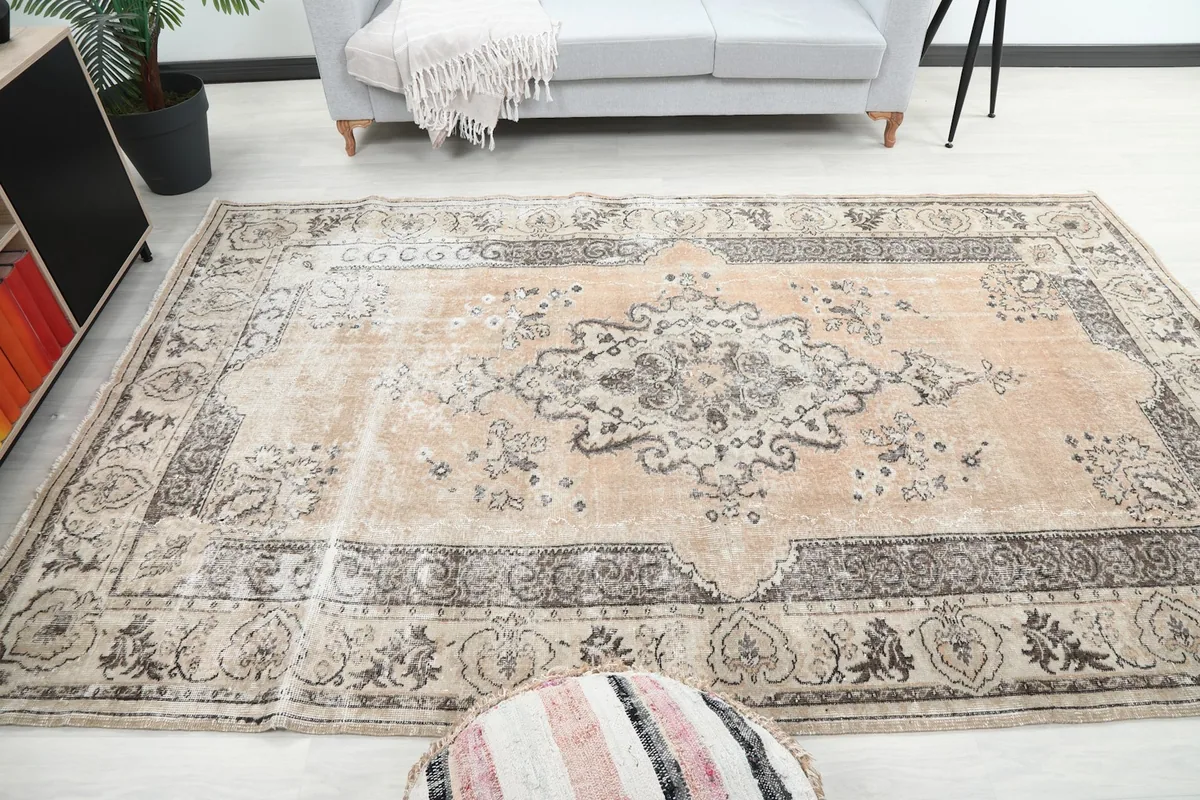 Full view of the rug laid out in a room, offering perspective on its large size