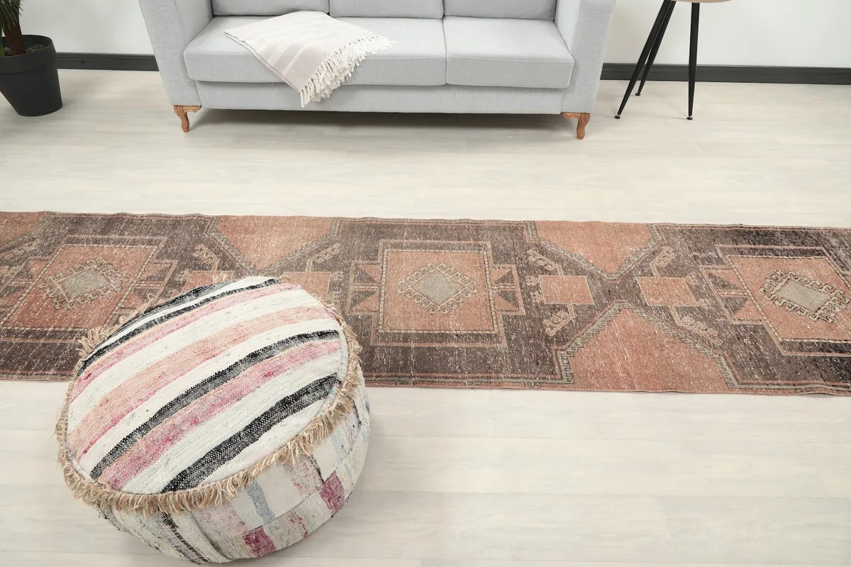 Full length of the runner rug in a room setting, emphasizing its fit in a long space.