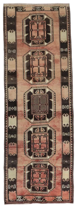 Full top view of the rose geometric Anatolian runner on a white background
