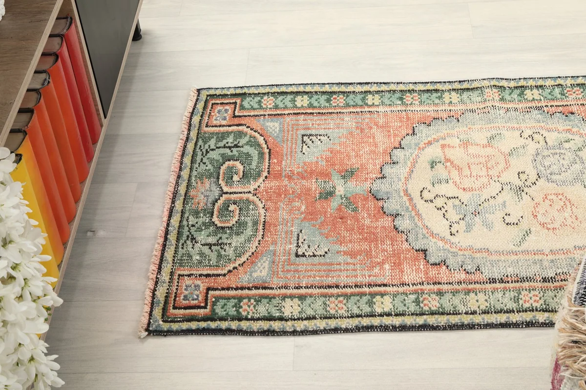 Angled view of the rug, showing its overall shape and design from above