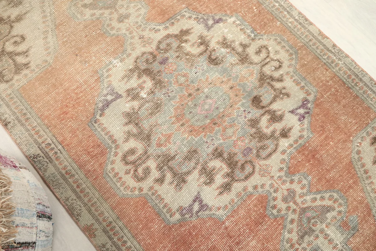 Overhead angled shot highlighting the central medallion and surrounding patterns