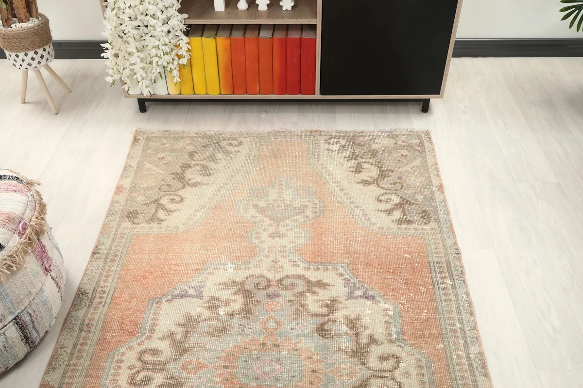 Overhead view of the rug, showing its full design and warm color palette
