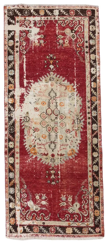 Full overhead view of the red and ivory vintage Anatolian runner