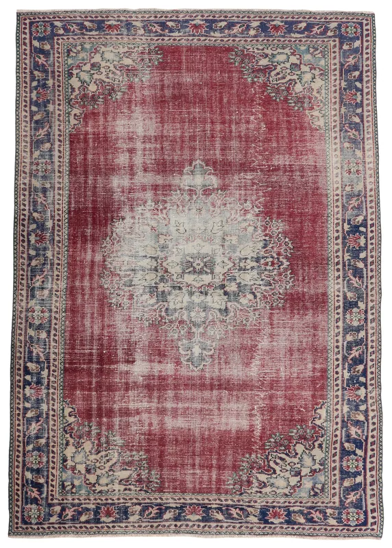 Full top view of the 7'5" x 10'7" vintage Anatolian area rug with rust field and navy border