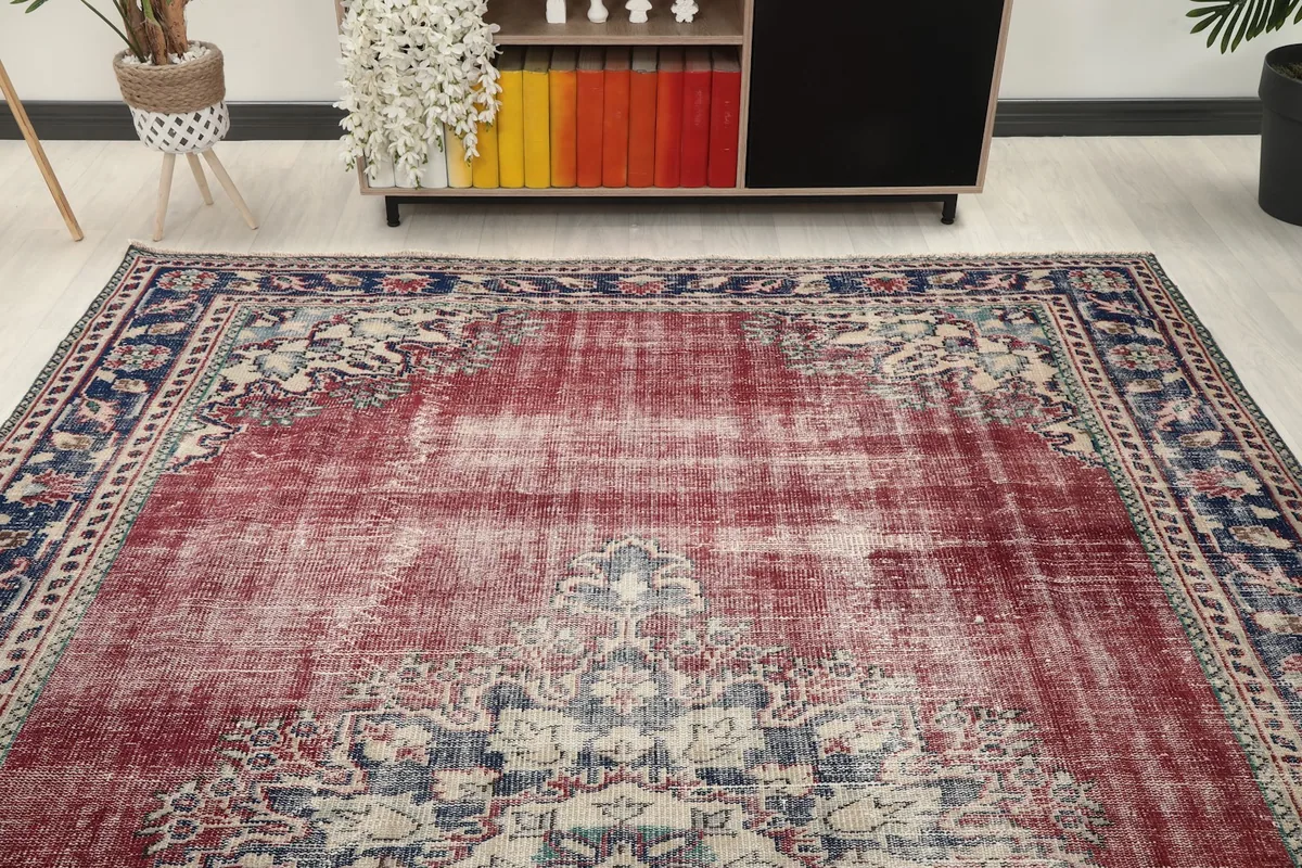 Overhead view of the rug in a room, highlighting its large size and placement