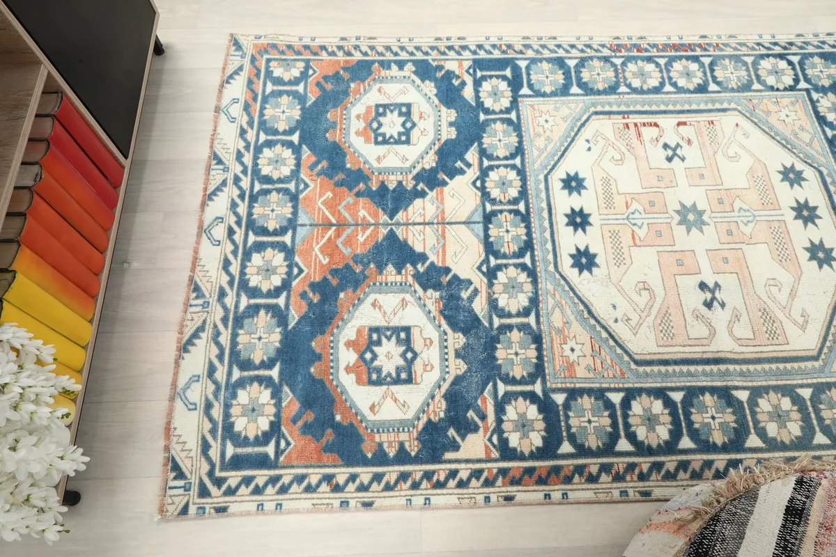 High angle view showing the full length of the rug and the varied patterns