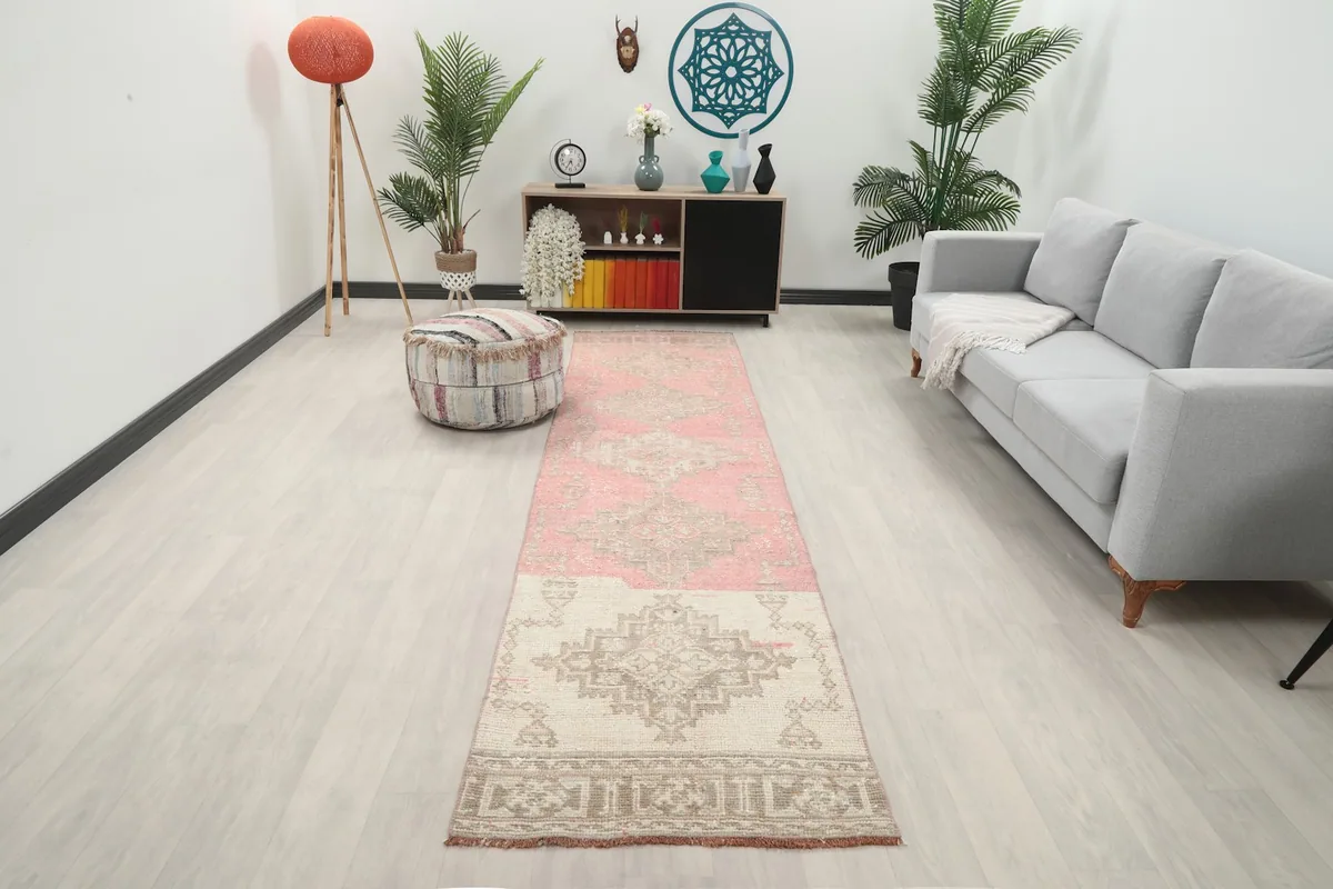 Runner rug displayed in a modern living space with light flooring and a gray sofa