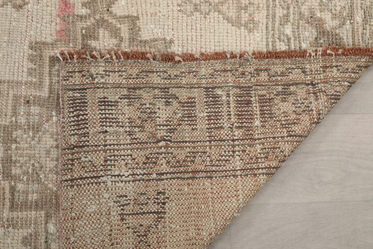 Close-up of the back of the rug, showing the dense knotting and craftsmanship