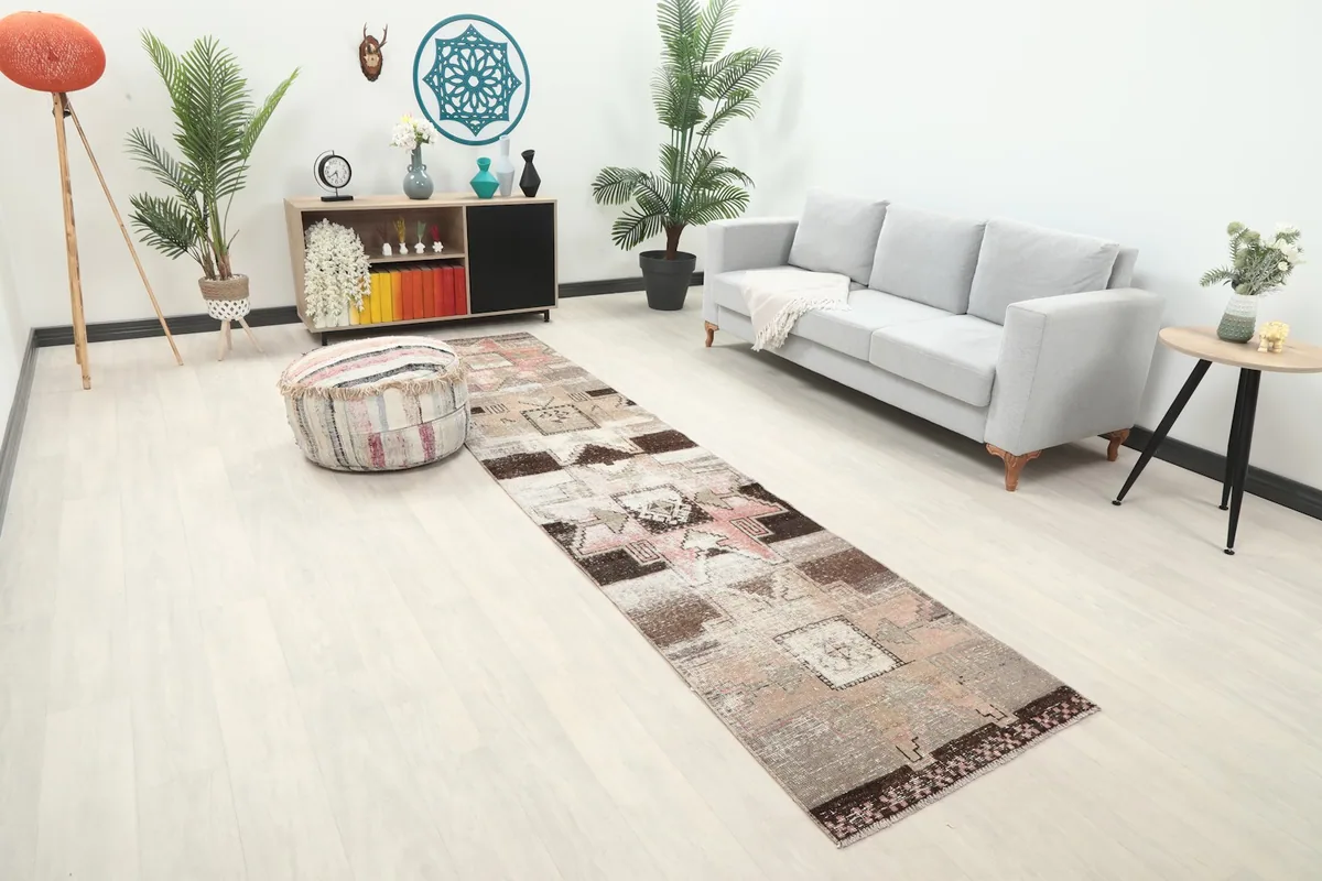 Angled view of the runner rug extending down a hallway in a contemporary home setting