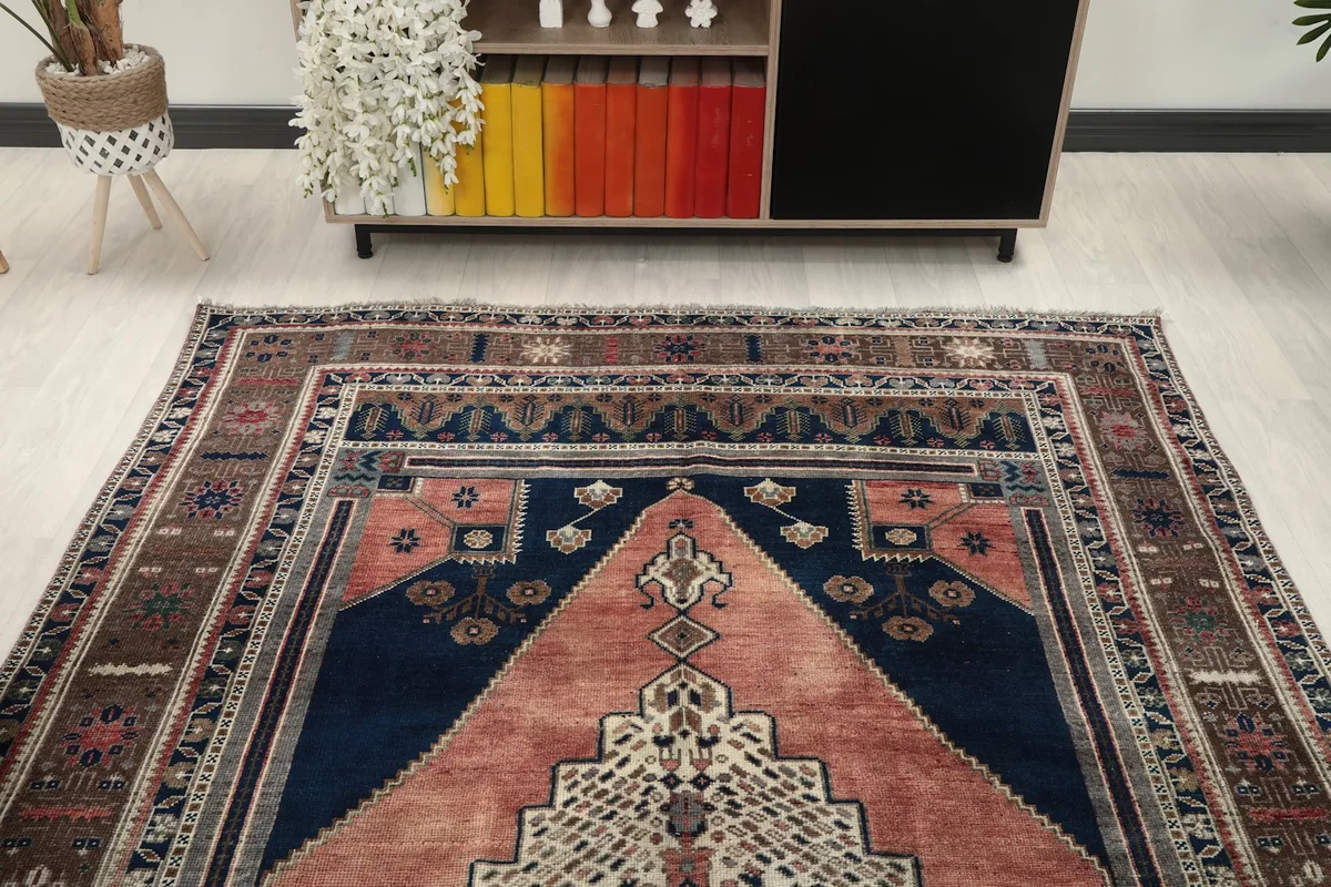 Overhead view of the rug placed in a room, highlighting its full design and proportions